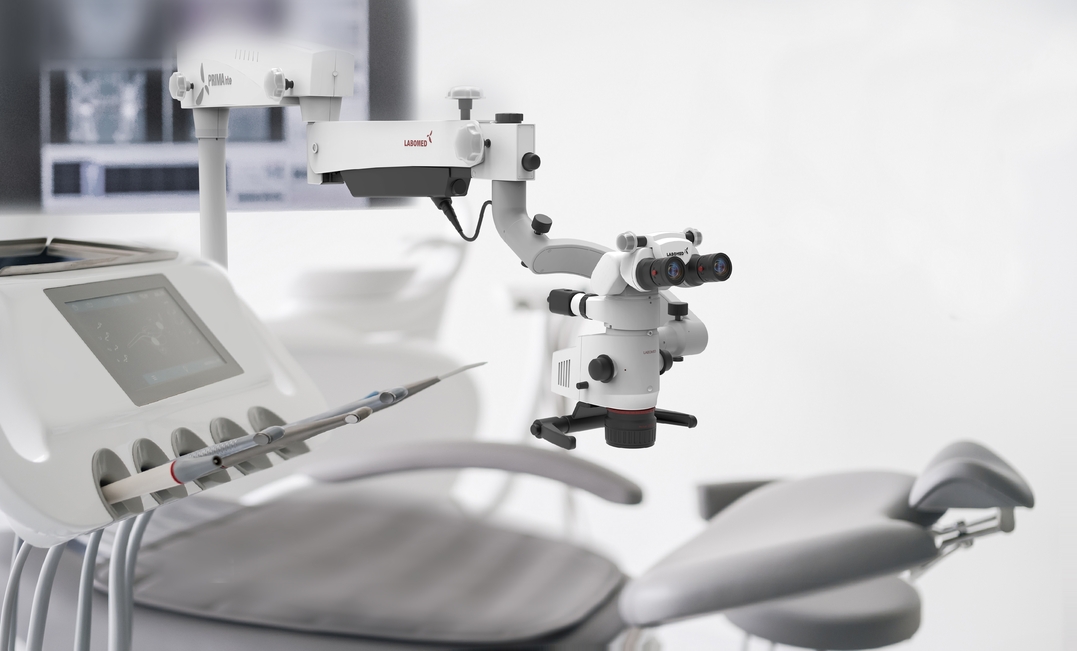 Interior of dental practice room with chair, lamp, display and stomatological tools Interior,Of,Dental,Practice,Room,With,Chair,,Lamp,,Display,And